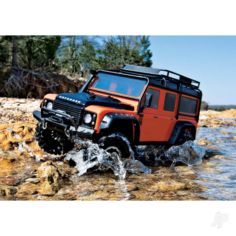 Traxxas Body, Land Rover Defender, adventure Orange (complete with ExoCage, inner fenders, fuel canisters, and jack)-6