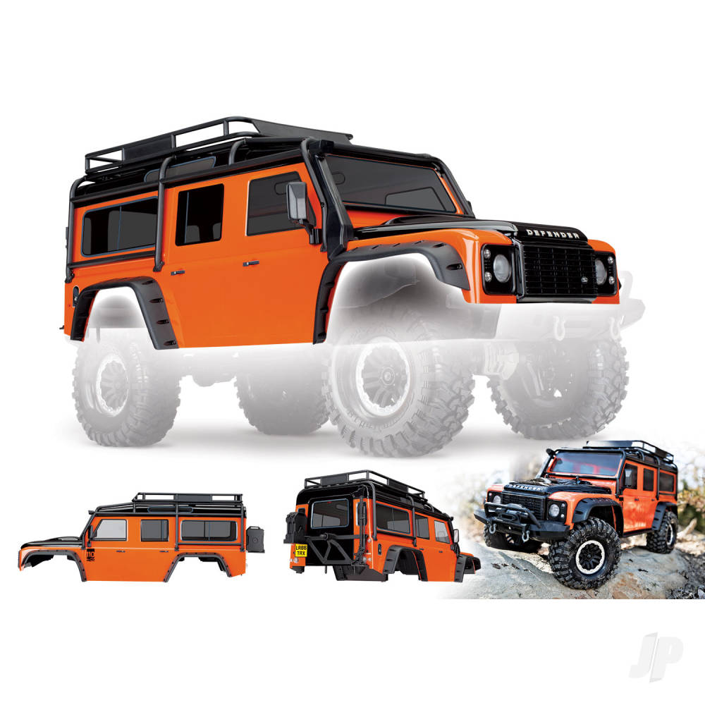 Traxxas Body, Land Rover Defender, adventure Orange (complete with ExoCage, inner fenders, fuel canisters, and jack)-7