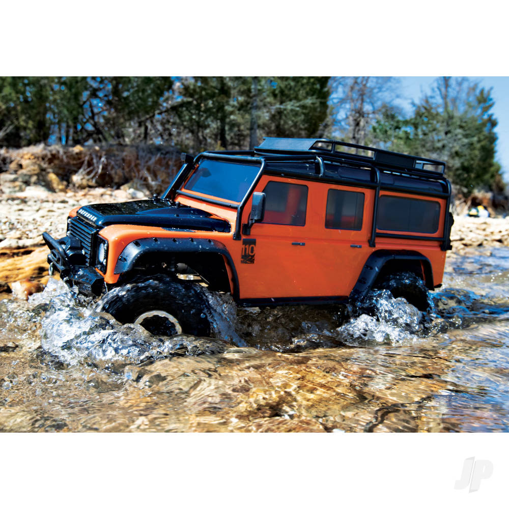 Traxxas Body, Land Rover Defender, adventure Orange (complete with ExoCage, inner fenders, fuel canisters, and jack)-8